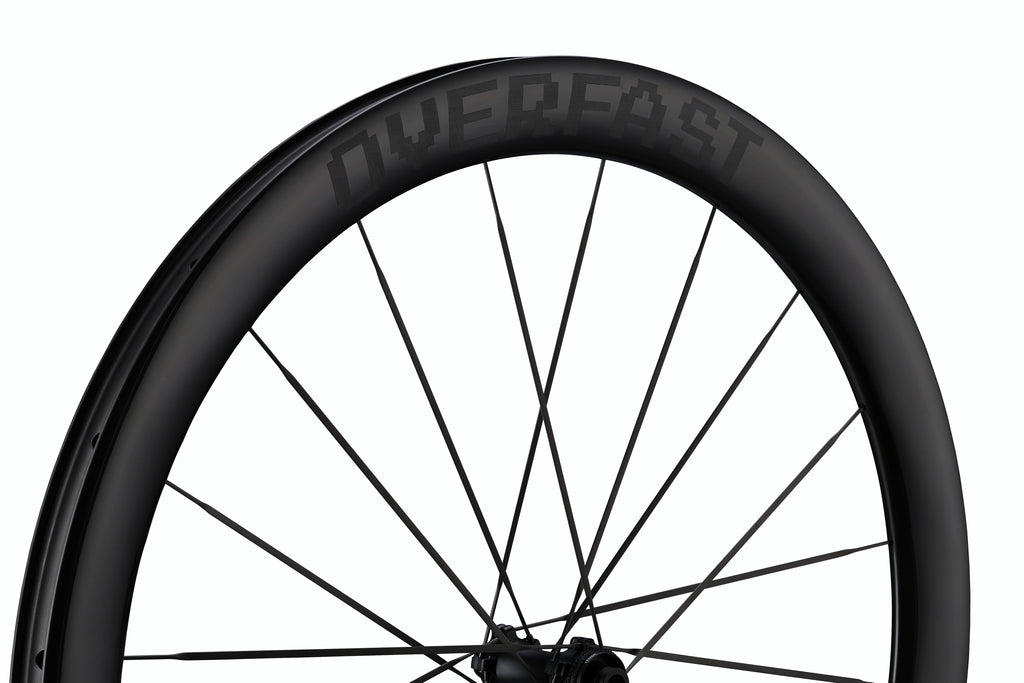 Bicycle wheel with 'Husqvarna' branding on a white background