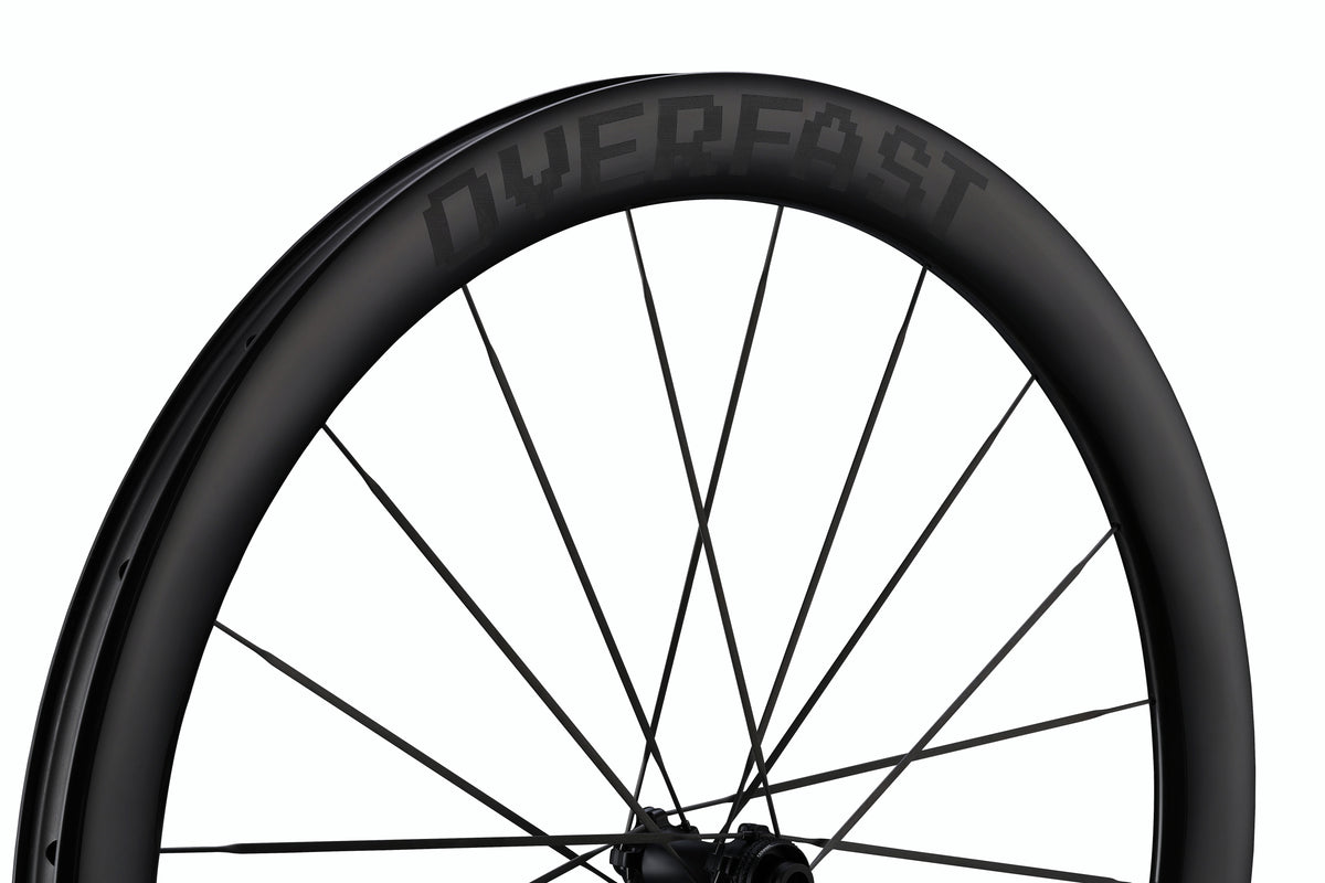 Bicycle wheel with 'Husqvarna' branding on a white background