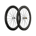 Two black bicycle wheels on a white background