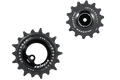 Two black Jetstream bicycle chaintensioner pulleys, one showing the front face with the Tripeak logo and the other showing the side profile, on a solid white background.