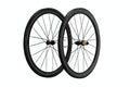 Two black carbon fiber road bicycle wheels with thin spokes and a gold hub accent, shown against a solid white background.