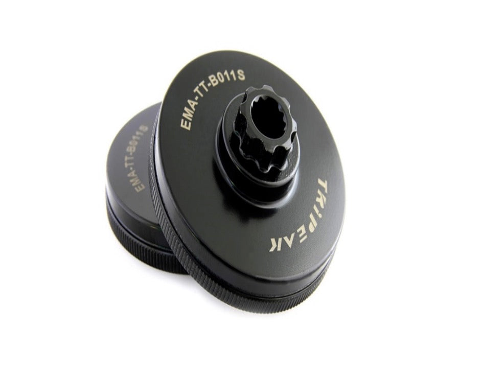 A black metal triple hook socket adapter with white printed text reading 'EMA-TT-5011S' and 'TRIPLE HOOK', shown on a clean white background.