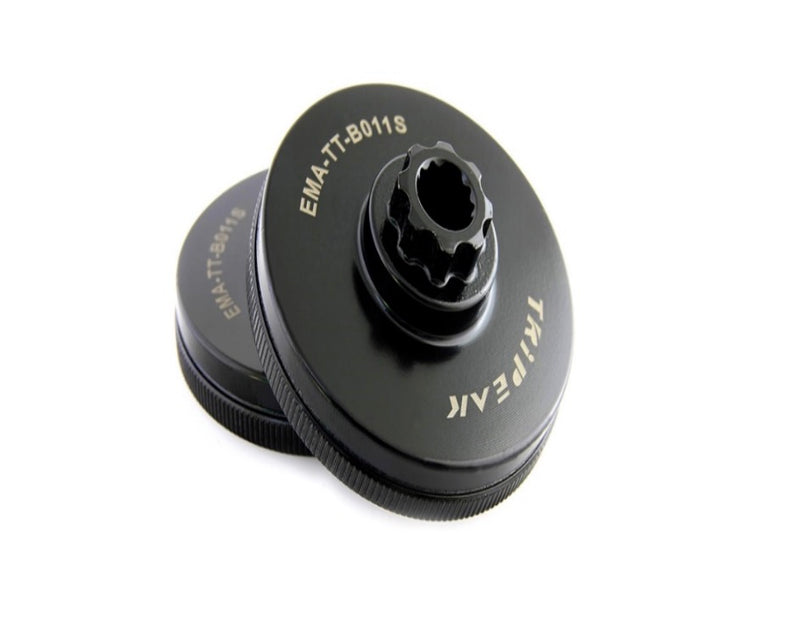 A black metal triple hook socket adapter with white printed text reading 'EMA-TT-5011S' and 'TRIPLE HOOK', shown on a clean white background.