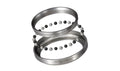 Two metallic bearing rings with rows of small black and silver balls, shown on a plain white background. The lower ring has the text 'JETSTREAM PRO' printed on it.