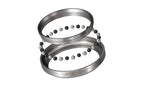 Two metallic bearing rings with rows of small black and silver balls, shown on a plain white background. The lower ring has the text 'JETSTREAM PRO' printed on it.